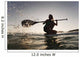 A Woman Paddling While Wall Mural