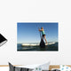 A Woman Paddling While Standing On A Surf Board Off Dos Mares Beach Wall Mural