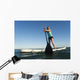 A Woman Paddling While Standing On A Surf Board Off Dos Mares Beach Wall Mural