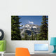 Mountain Peak Framed Between Trees Under A Blue Sky Wall Mural