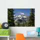 Mountain Peak Framed Between Trees Under A Blue Sky Wall Mural