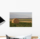 Hay Bales In A Field With Mountains In The Background At Sunrise Wall Mural