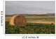 Hay Bales In A Field With Mountains In The Background At Sunrise Wall Mural