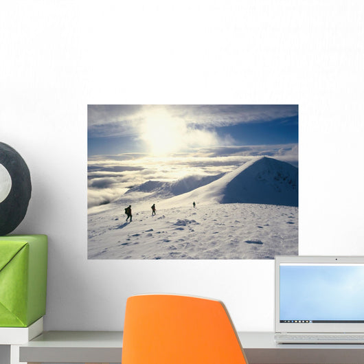 Hikers On A Mountaintop In The Snow Wall Mural