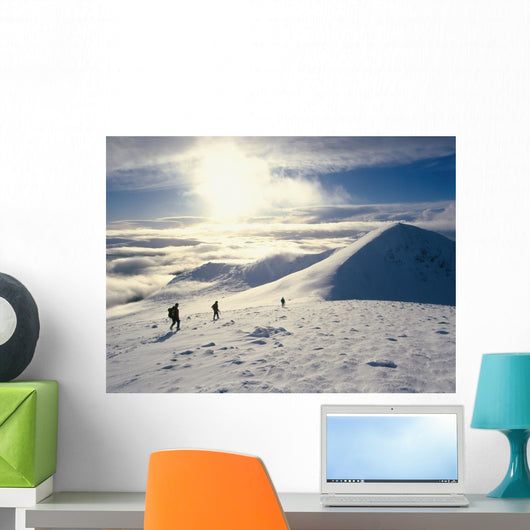Hikers On A Mountaintop In The Snow Wall Mural