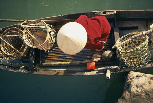 View From Above Of Vietnamese Woman In Conical Hat In A Boat Wall Mural