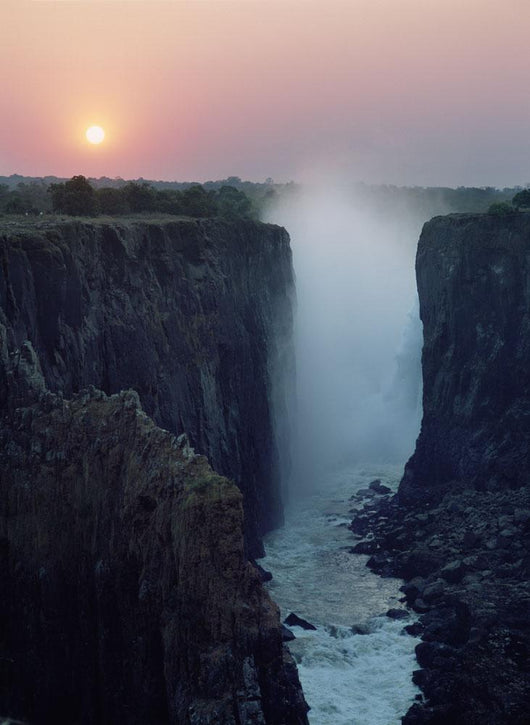 Looking Along Victoria Falls At Dusk From Zambia To Zimbabwe Wall Mural
