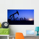 Silhouette of oil pump jacks with sunset Wall Mural