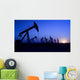 Silhouette of oil pump jacks with sunset Wall Mural