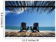 Two Chairs On Deck By Ocean Shaded By Grass Roof Wall Mural