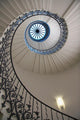 Looking Up At A Spiral Staircase Wall Mural