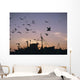 Sea Gulls Flying Over Fishing Boats At Dusk In The Harbor Wall Mural