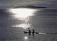 Fishermen Going Past The Island Of Domwe At Dusk Wall Mural