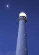 Moon Above Lighthouse At Dusk Wall Mural