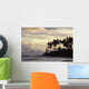 Silhouetted Palm Trees Over Beach At Sunset Wall Mural