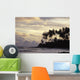 Silhouetted Palm Trees Over Beach At Sunset Wall Mural
