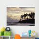 Silhouetted Palm Trees Over Beach At Sunset Wall Mural