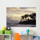 Silhouetted Palm Trees Over Beach At Sunset Wall Mural