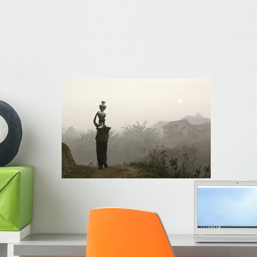 Bru Tribeswoman Carrying Water Pots On Her Head At Sunrise Wall Mural