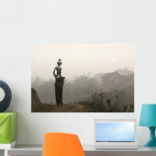 Bru Tribeswoman Carrying Water Pots On Her Head At Sunrise Wall Mural