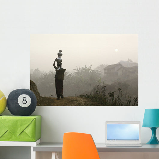 Bru Tribeswoman Carrying Water Pots On Her Head At Sunrise Wall Mural