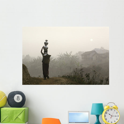 Bru Tribeswoman Carrying Water Pots On Her Head At Sunrise Wall Mural