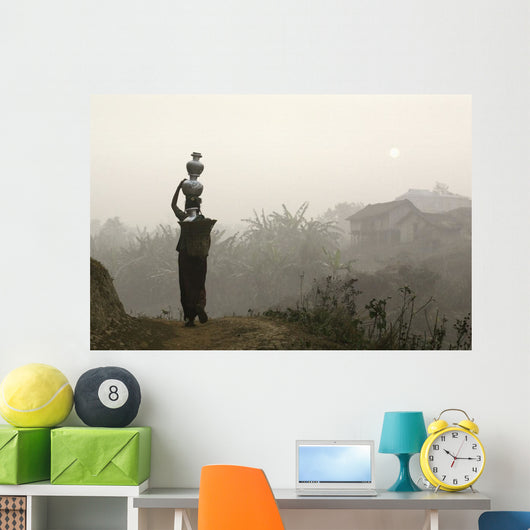 Bru Tribeswoman Carrying Water Pots On Her Head At Sunrise Wall Mural