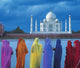 Women In Colorful Saris In Front Of The Taj Mahal Wall Mural