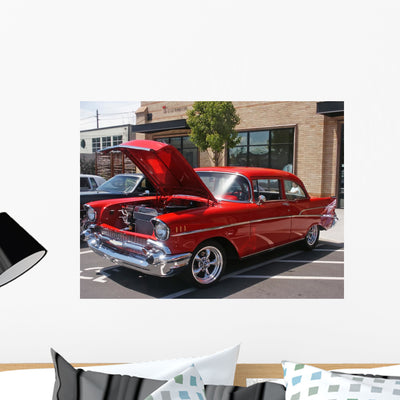 Red Hotrod 57 Chevy Wall Mural shown on a wall