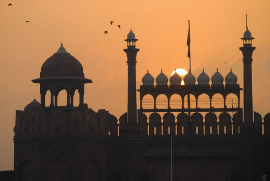Silhouette Of The Lahori Gate Of The Red Fort With Sun Rising Behind Wall Mural