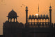 Silhouette Of The Lahori Gate Of The Red Fort With Sun Rising Behind Wall Mural