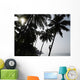 Silhouetted Man Climbing A Palm Tree To Pick Coconuts Wall Mural