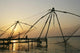 Chinese Fishing Nets Hanging In The Water At Sunset, Fort Kochi Wall Mural