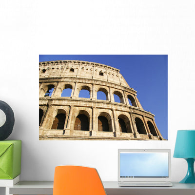 Colosseum and Blue Sky Wall Mural shown on a wall
