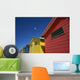 Seagull Flying Over Colorful Beach Huts Wall Mural