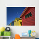 Seagull Flying Over Colorful Beach Huts Wall Mural