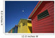 Seagull Flying Over Colorful Beach Huts Wall Mural