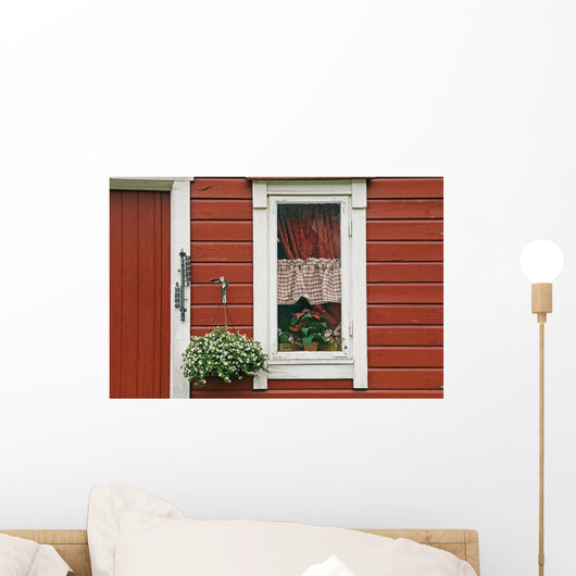 Red Wooden House With Plants In And By Window, Close Up Wall Mural