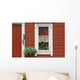 Red Wooden House With Plants In And By Window, Close Up Wall Mural
