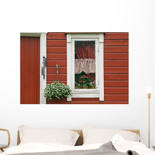 Red Wooden House With Plants In And By Window, Close Up Wall Mural