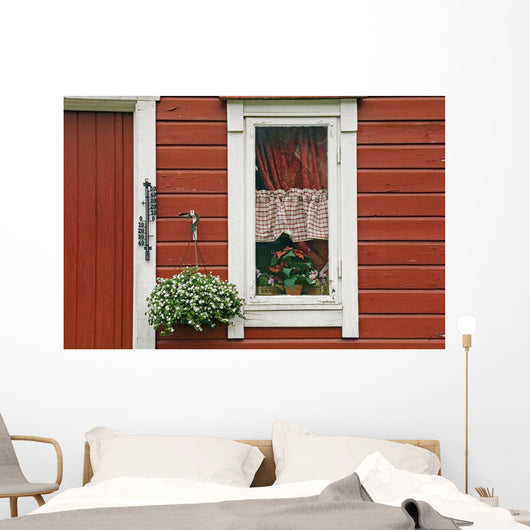 Red Wooden House With Plants In And By Window, Close Up Wall Mural