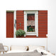Red Wooden House With Plants In And By Window, Close Up Wall Mural