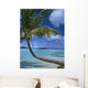 Palm Tree Leaning Over Sea Wall Mural