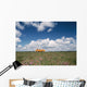 Campervan Going Down Road In Front Of Heather In Flower Wall Mural
