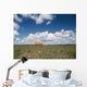 Campervan Going Down Road In Front Of Heather In Flower Wall Mural