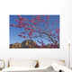 A Tree With Pink Blossoms In Red Rock Country Wall Mural