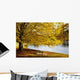 A Large Tree And Bench Along The Water In Autumn Wall Mural