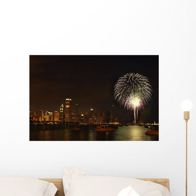 Fireworks against Chicago Skyline Wall Mural shown on a wall