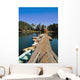 Old Wooden Pier And Boats In Harbor Wall Mural