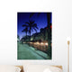 Palm Tree Lined Promenade With People Eating In Restaurants At Dusk Wall Mural